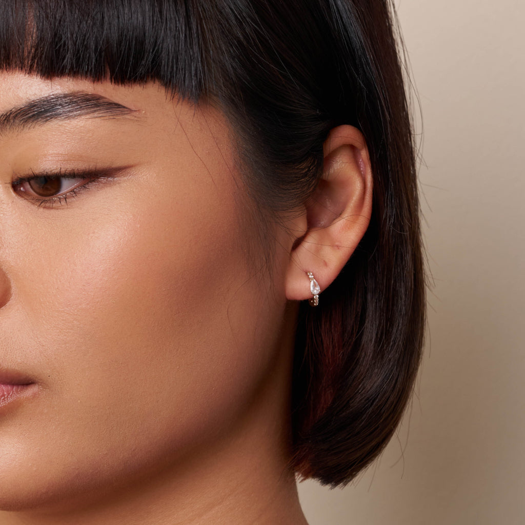 Gold Pear Cut Stone Huggie Hoop Earrings